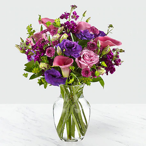 Elegant Purple Vase Arrangment with Greens
