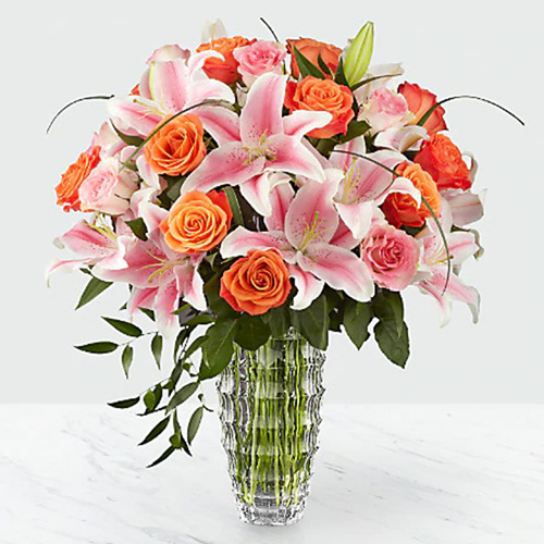 Dozen Orange Roses with Pink Lilies in a Vase