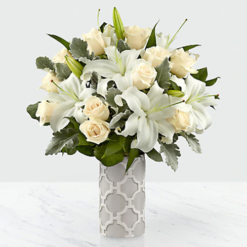 Dozen White Roses with White Lilies in a Graphic Vase